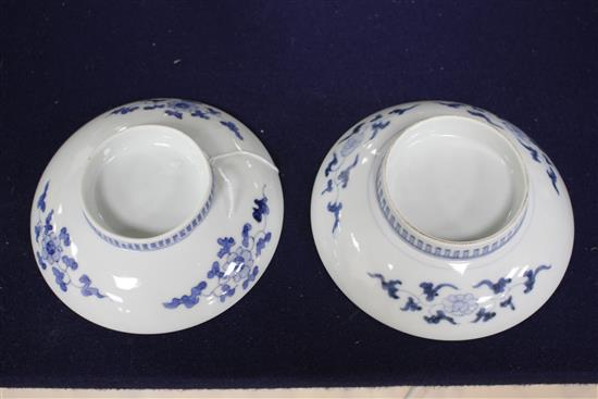 Two Japanese porcelain saucer dishes, decorated with irises and flowering trees, diameter 15.5cm